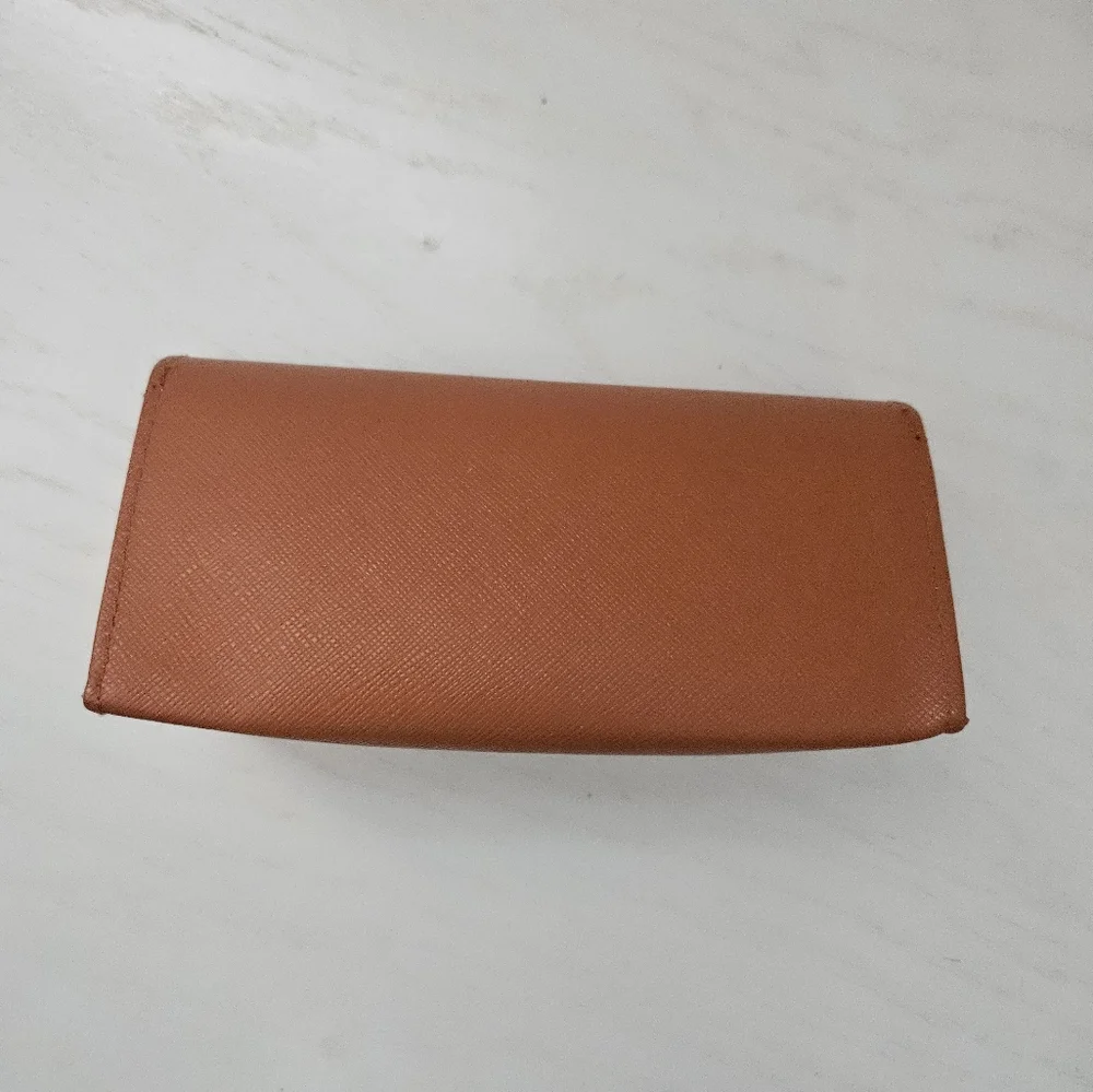 Tory Birch rust colored sunglasses case with‎ glasses cloth